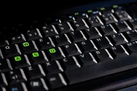 Plain data keyboard from a laptop computer standing in an office Stock Photos