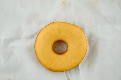 Plain donut isolated on grey background top view of baked food breakfast on.. Foto stock