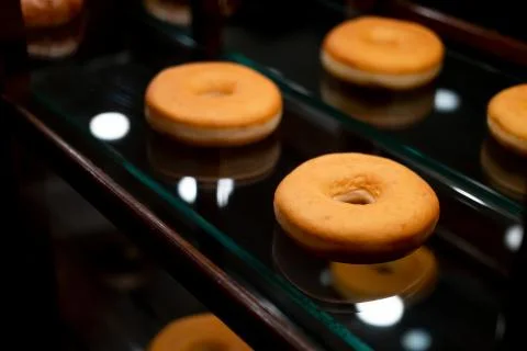 Plain donuts on a serving glass plate Stock Photos