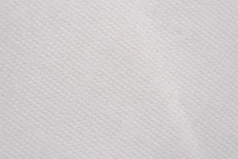 Plain fabric texture seen in close view showing small patterns light color to Stock Photos