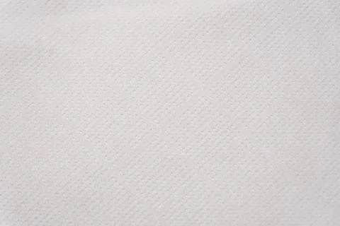 Plain fabric texture seen in close view showing small patterns light color to Stock-Fotos