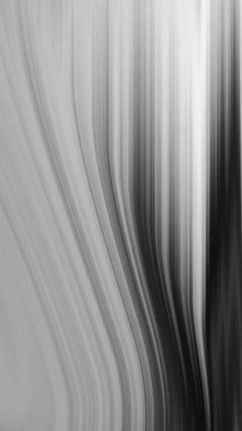 Plain gray background defines an abstract grayscale pattern of curving blurred v Stock Footage 327631067