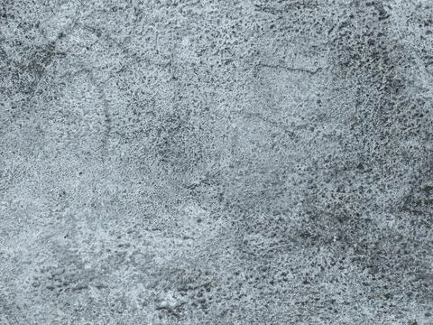 Plain gray concrete texture background with subtle grain. Foto stock