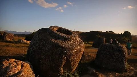 Plain of Jars in Laos with tourists in background Stock Footage 104120905