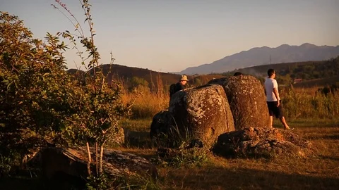 Plain of Jars in Laos with tourists Stock Footage 104120913
