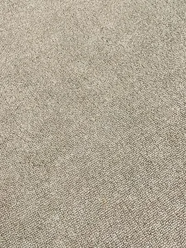 Plain light brown beige textured carpet fabric background template Stock Photos