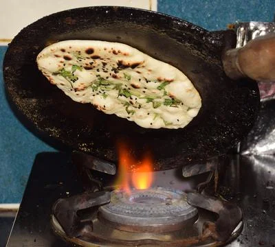 Plain naan making Stock Photos