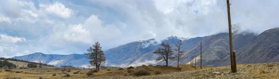 Plain at root of mountains Stock Photos