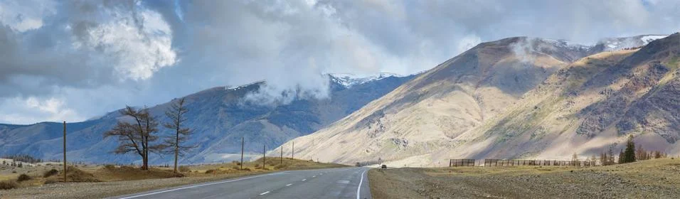 Plain at root of mountains Stock Photos