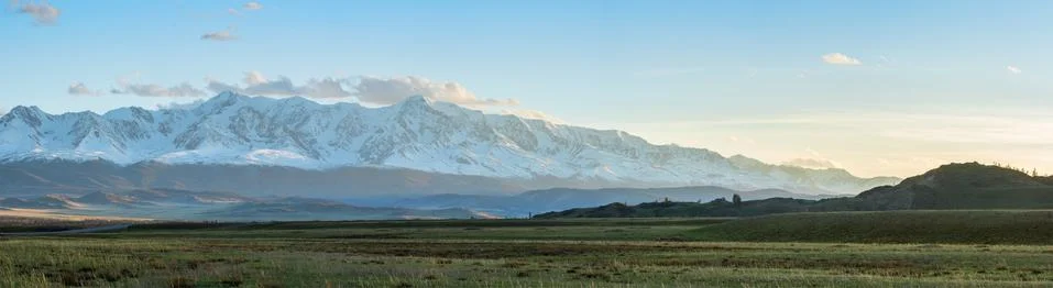 Plain at root of mountains Stock Photos