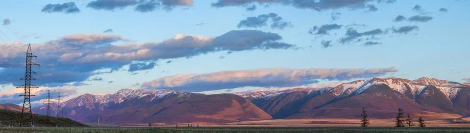 Plain at root of mountains Stock Photos