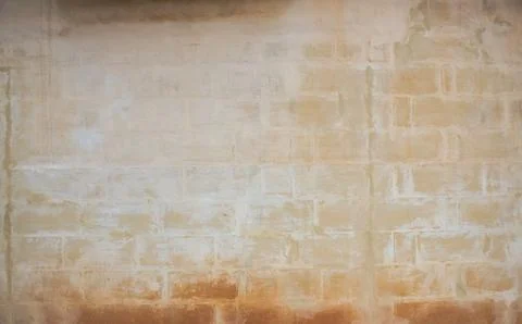 Plain stone wall texture background with grout between stone blocks Stock Photos