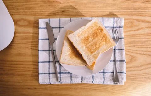 Plain toast on plate, top view Stockfoto's