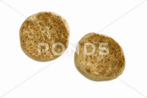 Plain Toasted English Muffin on White Background Stock-Fotos