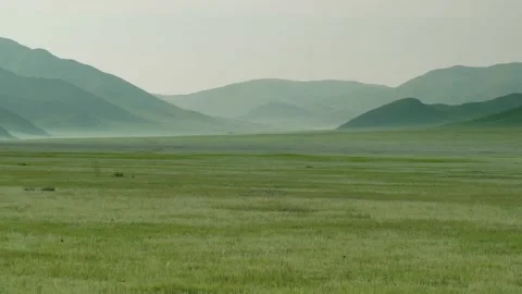 Plain in Treeless Wide Valley Stock Footage 146490363