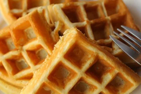 Plain waffles served on plate for breakfast close up top photo Stock Photos
