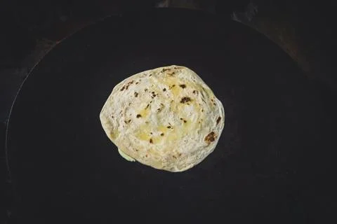 Plain Wheaten Flat Bread Isolated on White Background Top View Foto stock