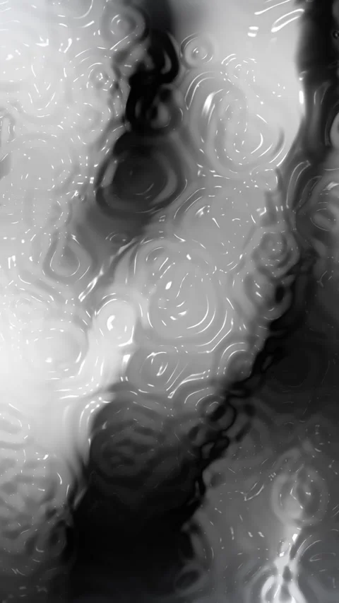 Plain white background highlights glossy monochrome rings and dark irregular sha Video stock 328998898