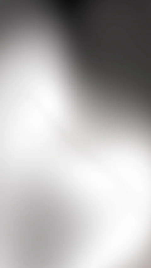 Plain white background provides subtle gradients of gray darkening and lightenin Video stock 327542166