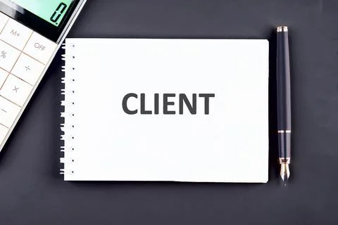 A plain white notebook features the word client prominently. Next to it, a ca Stock Photos