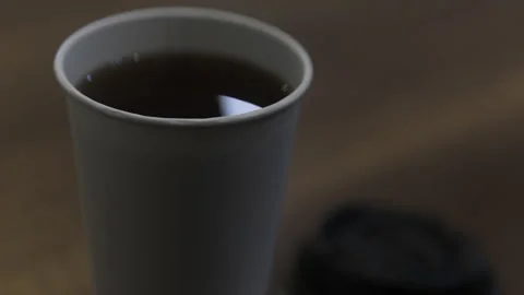 Plain white paler cup of black coffee or tea Stock Footage 335341914