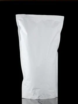 A plain white stand-up pouch package isolated on a black background showcas.. Foto stock