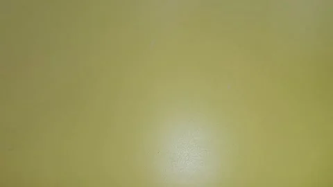 Plain yellow surface with no identifiable location. Ideal for abstract backgroun Видео 335065206