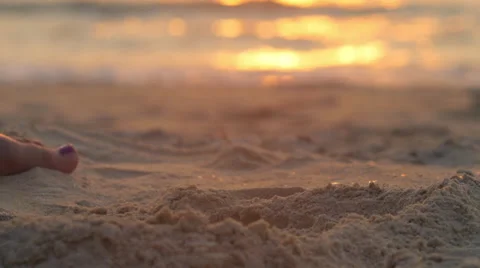 Plaing with sand on beach  Stock Footage 66371875