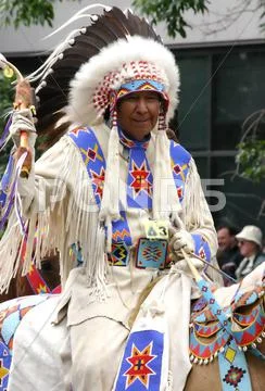Plains indian chief on horseback Stock Photos