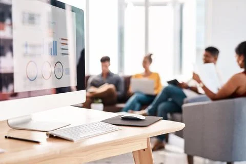 The plan is always to increase profits. Shot of a graphs on a computer screen in Stock Photos