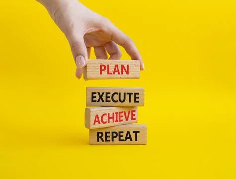 Plan Execute Achieve Repeat symbol. Wooden blocks with words Plan Execute Ach Stock Photos