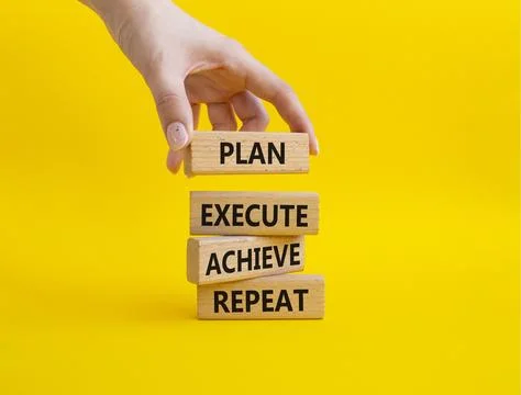 Plan Execute Achieve Repeat symbol. Wooden blocks with words Plan Execute A.. Stock Photos