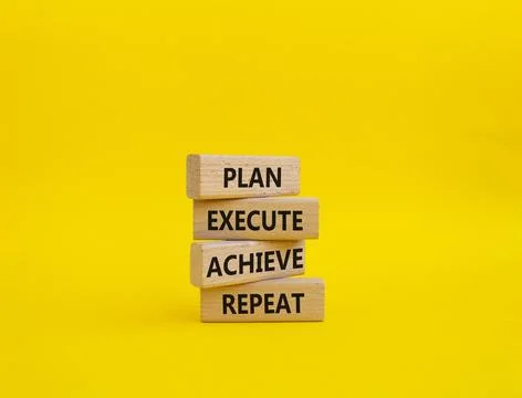 Plan Execute Achieve Repeat symbol. Wooden blocks with words Plan Execute A.. Stock Photos