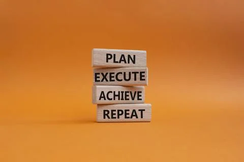 Plan Execute Achieve Repeat symbol. Wooden blocks with words Plan Execute A.. Stock Photos