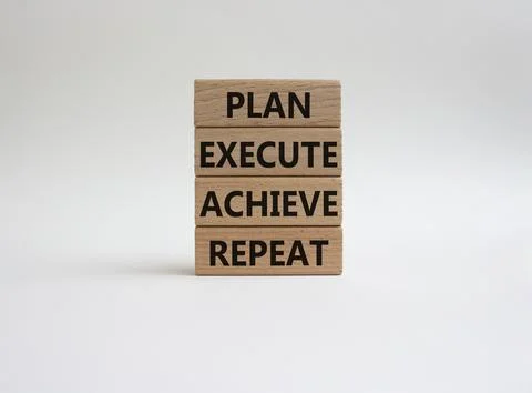 Plan Execute Achieve Repeat symbol. Wooden blocks with words Plan Execute A.. Stock Photos