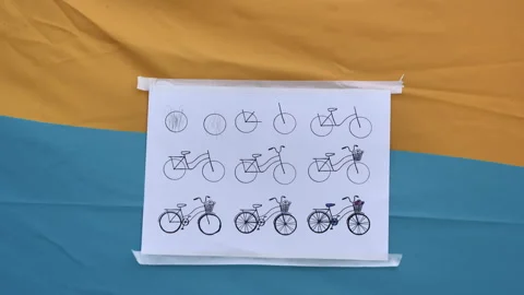 Plan how to draw a bicycle. Ukraine, Kiev - June 3, 2024 Student Bike Ride Stock Footage 273608244