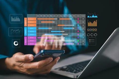 Plan project schedule as manager uses gantt chart timeline dashboard for co.. Stock Photos