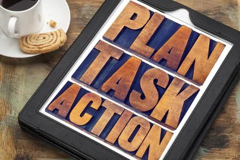  plan, task, action words on tablet plan, task, action word abstract - tex... Stock Photos