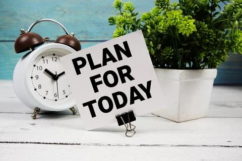 Plan For Today  text written on paper card with alarm clock on wooden backg.. Stock Photos