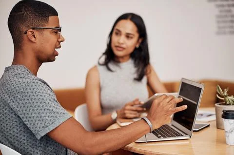Plan well before you implement anything. a young businessman using a laptop Stock Photos