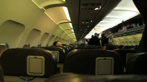 On the plane 7 - getting seated Stock Footage