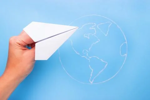 Plane above world map Stock Photos