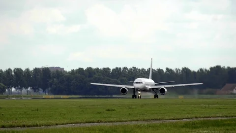 The plane accelerates and takes off Stock Footage 106204874