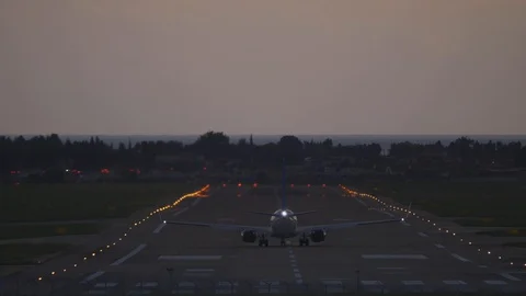 The plane accelerates on the runway Stock Footage 119885887