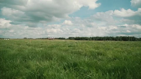 The plane is accelerating down the runway Stock Footage 147716224