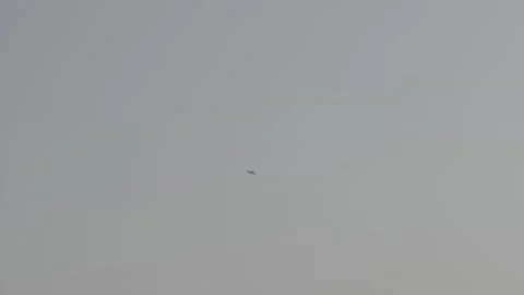 PLANE IN AIR CLOUDY DAY Stock Footage 168110453