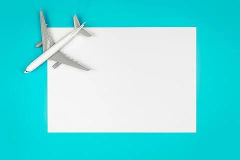 A plane, airplane on a blue background, flat lay, copy space. Stock Photos