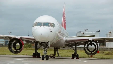 The plane at the airport Stock Footage 82309522
