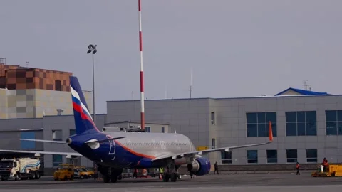Plane at the airport Stock-Footage 102090564