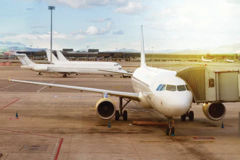Plane at airport Stock Photos